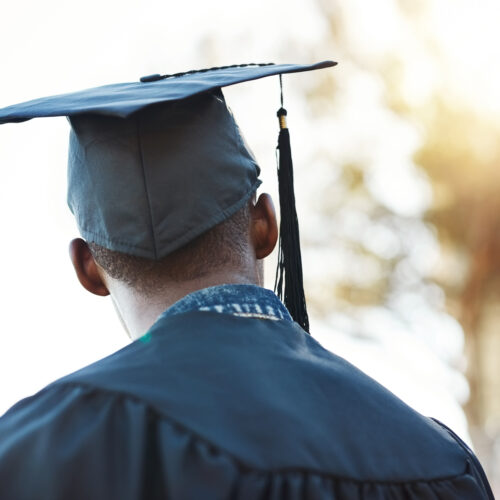 College graduate looking towards his future to showcase the DEVENEY Higher Education Practice Area